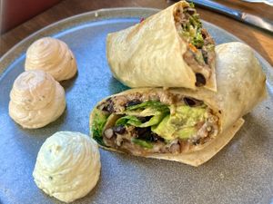 Macho burrito with house-made chipotle and jalapeño aioli  at Plum Bistro in Seattle