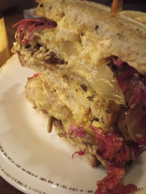 Reuben  up close, two halves stacked at Plum Bistro in Seattle