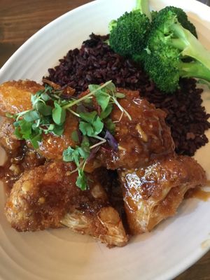 General tso cauliflower soooo crispy with forbidden rice at Plum Bistro in Seattle