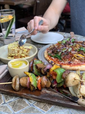 Spicy Cajun Mac & Yease, Mediterranean Kebab Plate, Sausage, Mushroom & Spinach Pizza at Plum Bistro in Seattle