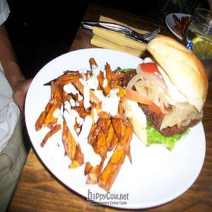 THE CAJUN TEMPEH BURGER beaded tempeh on fresh baked bun with grilled sweet onions,
spring greens, tomates,lemon-basil aioli & ketchup $15 at Plum Bistro in Seattle
