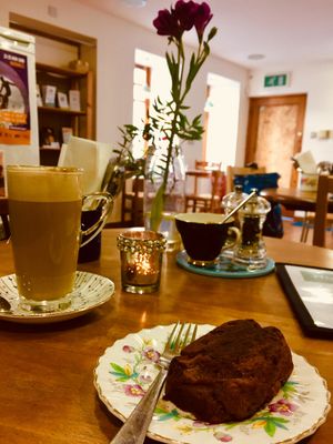 Dirty chai latte and sweet cake at Nourish in Inverness
