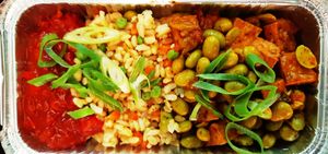 diepvriesmaaltijd: gebakken rijst, tofu met edamame, paprika-tomatensausje at Change All Vegan - Food Truck in Lier
