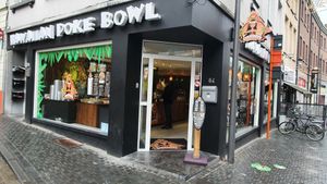 On the corner. Small step to get in.  at Hawaiian Poke Bowl in Leuven