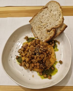 Vegan brunch: Spiced cauliflower, hummus, fried chickpeas with chimichurri. at Bastard Coffee & Kitchen - Bajo Izda in Valencia