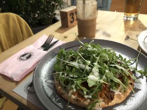 Flatbread with vegan soya mince and a chocolate banana almond milk smoothie   at Estrella in Paphos