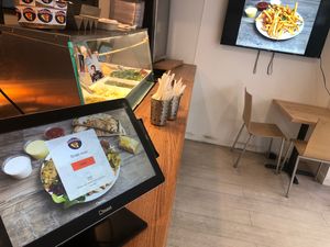 Ordering kiosk and view of some of the entrees.  at The Flying Falafel - Financial District in San Francisco