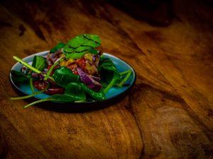 Spinach salad | With mango, sundried tomato and balsamic syrup  at Gossimijne in Oss