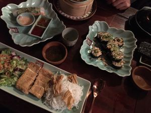 Main course. Ricenoodles, Fried crispy Tofu, fresh salad with a creamy Dressing and for the noodles an extra Dressing too at Top Tep - Modern Vietnamese Kitchen & Bar in Berlin