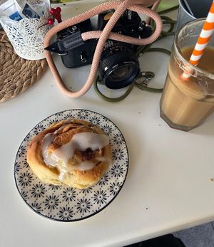 Warm vegan cinnamon bun and iced coffee   at Calma Cafe in Gran Canaria