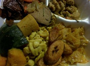 platter of good Vegan eating, BarBQ, seitan, curry, squash, mac & cheese, cabbage, plantain's at Healthful Essence in Atlanta