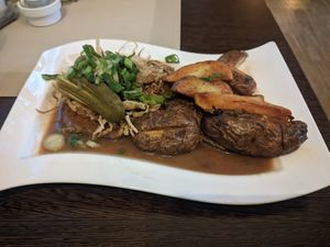 Onion roast soy loafs with baked potatoes at Bierosophie in Vienna