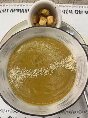 Cream of lentil soup with croutons ( omit drizzle of cream )  at CrepeCafe in Astana