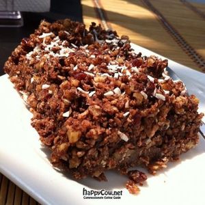 Raw vegan brownie - this one has coconut, dark chocolate, cranberries and is sweetened with agave at Mantras Veggie Cafe and Tea House in San Jose