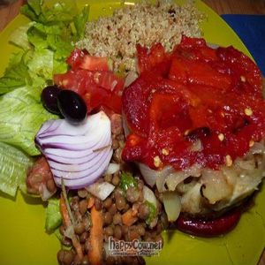 Escalivada (roasted eggplant, red pepper and onion) with quinoa and salad. at Birosta in Zaragoza