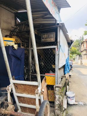 Old street sign to show what part of Dien Bien Phu st it is at at Banh Mi Cart in Hue