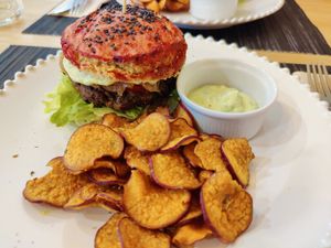 Beans burger with sweet potato crisps at Raiz in Aveiro