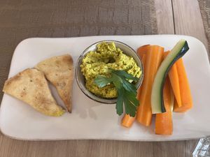 Hummus with homemade bread and veggie sticks  at Raiz in Aveiro