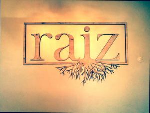 Logo on the wall at Raiz in Aveiro