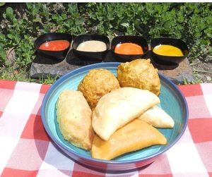 Antójate con una empanada de pipián (papa con maní), empanada de arroz con proteína de soya, pastel de yuca con proteína de trigo o una papa rellena. Puedes acompañarle con ajíe de maní, ceviche, huacatay y/o rocoto.  at Beth Lehem Vegano Panadería y Pastelería in Bogota