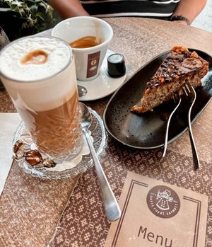 Coffee with soymilk or oatmilk possible. Vegan and gluten free bananacake  at Petit Royal in Zermatt