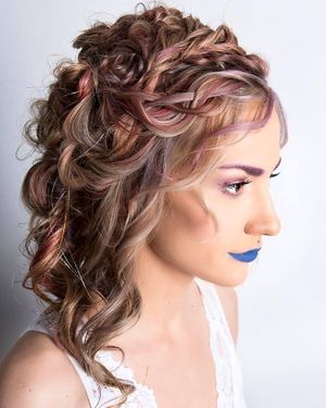 Soft pastel highlights with all colors of the rainbow. at Head Case Hair Studio in Keller