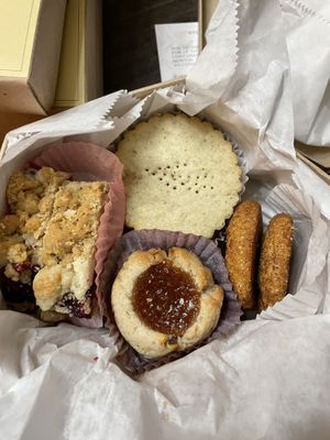 Thanksgiving cookie tin. Pumpkin snickerdoodles and carrot cake thumb print cookies are to die for    at Sweet Maresa's in Kingston