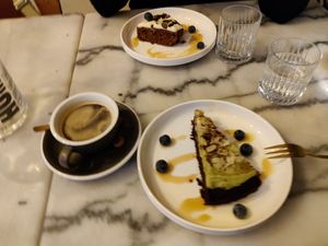 Carrot cake (top) and matcha chocolate (bottom) with coffee at HUMM Restaurant in Antwerpen