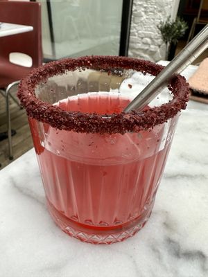 Homemade spiced iced tea with hibiscus tea and star anice  at HUMM Restaurant in Antwerpen