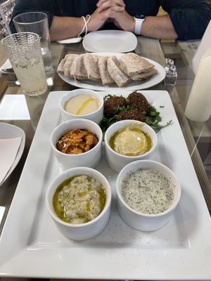 Mezze Platter (Falafel, Hummus, Muhammurah, Babaganoush, Tahini, Mint Yogurt Sauce)  at Koshari Mama in Somerville