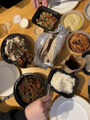 Moussaka, mushroom shwarma, Muhamara, hummus, salad  at Koshari Mama in Somerville