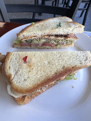 Club sandwich with some of the best tofu bacon I’ve ever had.   at Manna Kitchen in Lisle