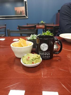 Chips, guacamole, and tea. at Manna Kitchen in Lisle