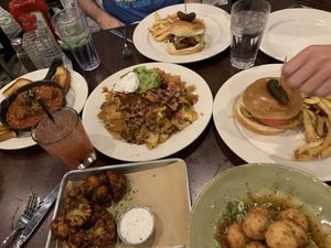 Vegan nachos, vegan meatballs, vegan BBQ sandwich, vegan chix sandwich, & cauliflower bites at Busboys and Poets - Mount Vernon Triangle in Washington