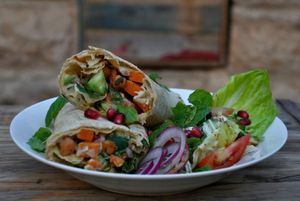 sweet potato, roasted chickpeas, lettuce and I'm not telling you the rest come ad try😄   at Kawon once upon a time in Madaba