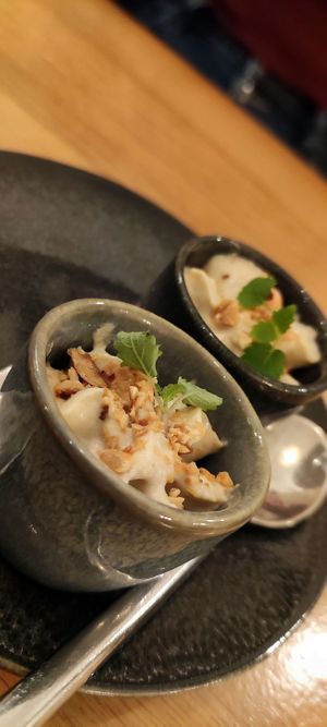 Special diner : Creme de topinambour, feve de tonka, éclats de noissettes et pousses de mélisse at the friendly kitchen in Paris