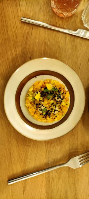 Special diner : Tartare de fruits et légumes jaunes, mayonniase au schimimi togarashi, fleur de tagète. at the friendly kitchen in Paris