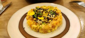 Special diner : Tartare de fruits et légumes jaunes, mayonniase au schimimi togarashi, fleur de tagète. at the friendly kitchen in Paris