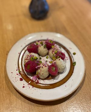 Raspberry and pistachio tart  at the friendly kitchen in Paris