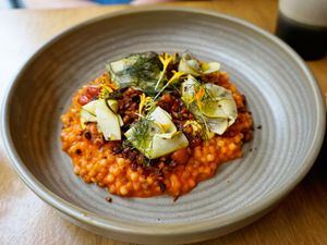Risotto de fregola sarda à la crème de poivrons confits (summer 2024) at the friendly kitchen in Paris