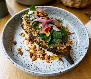 Aubergine confite à la mélasse de grenade (summer 2024) at the friendly kitchen in Paris