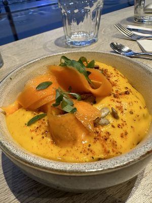 Yellow carrot espuma with saffron  at the friendly kitchen in Paris