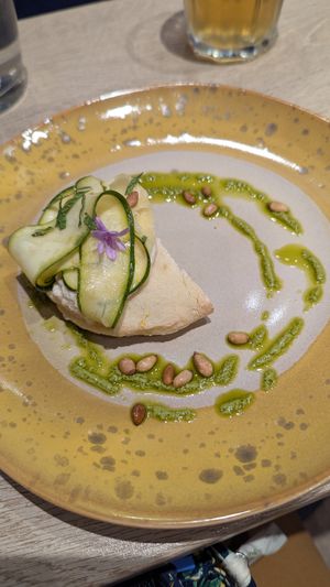Pita with lemon sauce, pesto, and hummus at the friendly kitchen in Paris