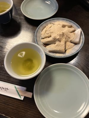 Kuzumochi on the right, rice cake with brown sugar syrup and soybean flour. Green teas on the left. 660¥  at Takemura in Tokyo