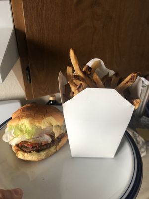 Don’t let these photos fool you. This food was amazing covid is no benefit to food display. This is the spicy bbq burger vegan w/ fries at Pretty Good Advice - Soquel in Soquel