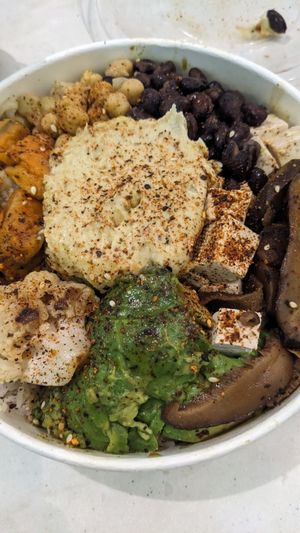 Warm bowl with sooo many toppings at SEA - Evergreens in Seattle