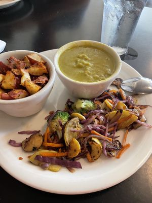 Vegan meal of Home fries, veggies and split pea dal very tasty!  at The Grit in Athens