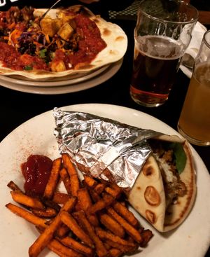 Vegan gyro with sweet potato fries and “mondo” burrito at The Grit in Athens