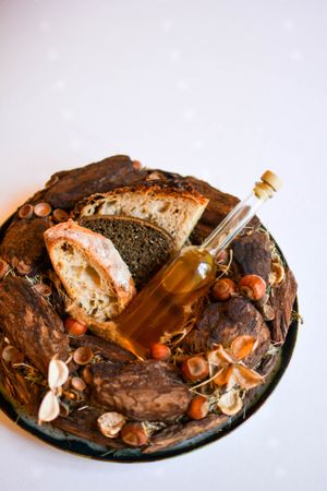 own-baked breads / buckwheat chips / white poppy seeds oil at White Rabbit - Biały Królik in Gdynia