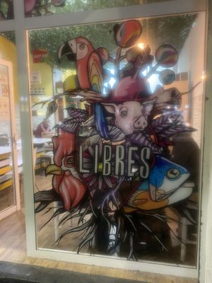 Beautiful vegan artwork in the window  at A Raices in Gran Canaria